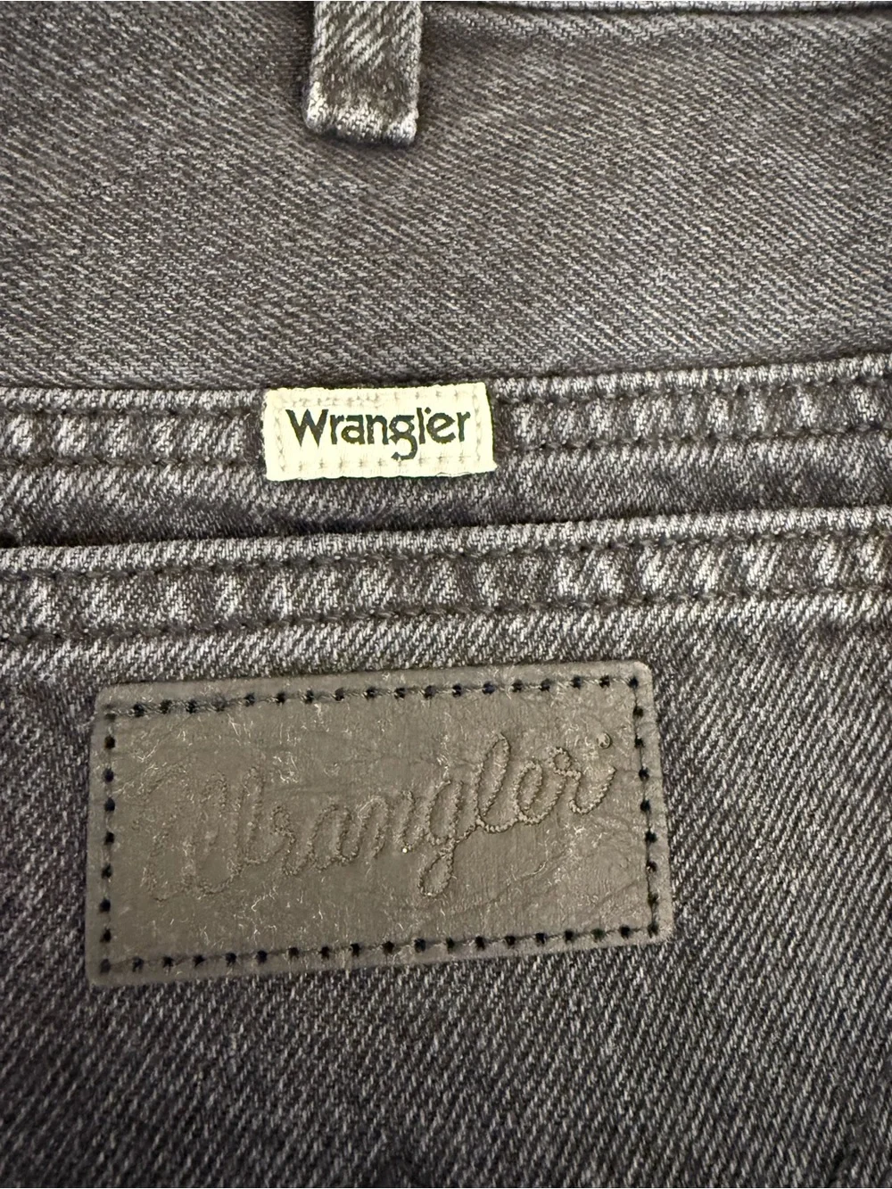 Wrangler Women’s High-Rise Festival Denim Shorts in washed black. Size 27